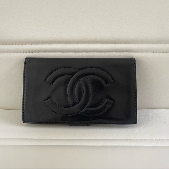 CHANEL Handbags - Chanel lambsking Bi-fold French long Wallet in Dark Navy Blue Color